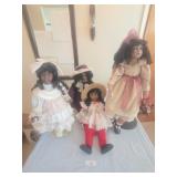 4 large plastic and porcelain dolls