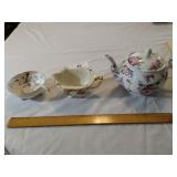 Teapot, cream pitcher, gravy dish with ladel