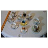 Group demitasse cups and saucers