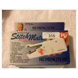 Remington hand held sewing machine