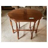 6 leg scalloped edge table 20' x 32' x 30' tall