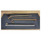 Old Canes and Advertising Yard Sticks