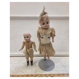 Pair of Antique Porcelain and Paper Mache Dolls -