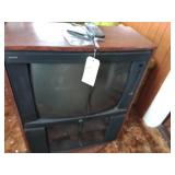 25' Zenith tv w/remote in cabinet