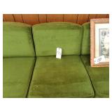 Tufted green swivel chair