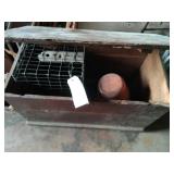 wooden box, orange car light, animal trap