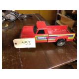 Red metal Tonka truck