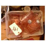 assorted pink depression dishes