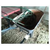Wheel barrow with hose