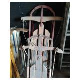 2 wooden sleds
