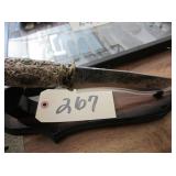 Etched laser wolf knife