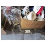 Glass top table, hats, oscillating fan