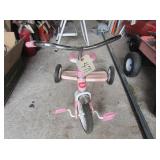 pink child's radio flyer tricycle