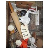 measuring cups, grater, misc kitchen items