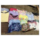 21 lady shirts, 4 shorts size extra large