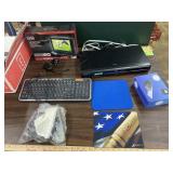 7" portable tv, dvd player, keyboard mouse, misc
