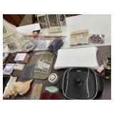 Table load, shower curtain, lamp, coin wrappers,