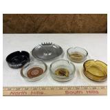 7 ash trays, 6 are advertising