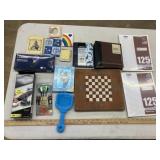 photo books, notebook paper, magnifying glass,