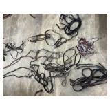 Approx 6 halters, bits leads plus extras