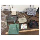 7 misc purses, 1 marked leather, rosetti,