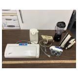 6 appliances, can opener, mixer, ziplock sealer,