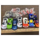 Lot of cars including 4 pull back ones, one has