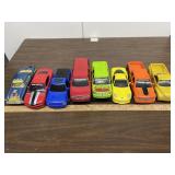 8 plastic cars & motorcycle, flame car has a pull