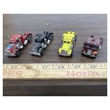 4 trucks marked Universal Product, 1978