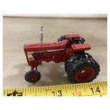 1/64 IH 706 tractor, christmas flakes on it,