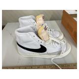 Nike 1 marked size 7, other 7 1/2