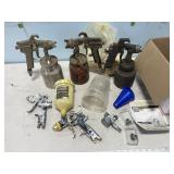 Paint sprayer guns