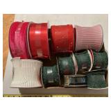 11 new rolls of ribbon, 9 to 30 ft in length