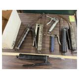 Box of grease guns