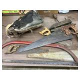 5 hand saws, wood clamp & grass seeder