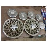 4 Cadillac, 2 chevy Cavalier hub caps &h