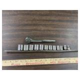 Craftsman 3/8 in drive ratchet and 12 sockets