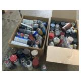 2 boxes of spray paint, some full, some used
