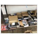 Lot of Automotive break pads, spark plugs,