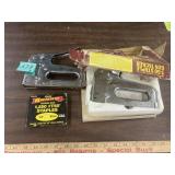 2 arrow staple guns and staples, one looks new