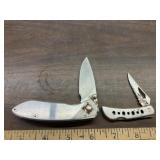 2 lock blade knives, 1 marked buck