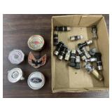 lot of vintage car cigarette lighters, car emblems