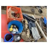 Lot on table includes metal brackets, tire irons,