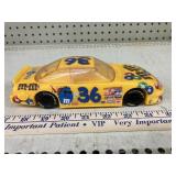 M&M Pontiac Grand Prix candy dispenser, plastic