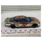 #9 Jeff Burton gold tone Ford Taurus,by Racing