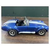 1/18 Shelby Cobra by Ertl in display case