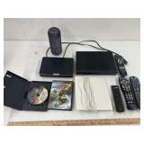 2 dvd players, 2 games  & other electronic items