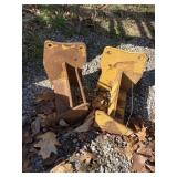 Pair weight brackets for John Deere skid loader