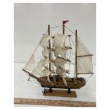 Red Flag wooden ship, approx 13 x 13 1/2 x 3