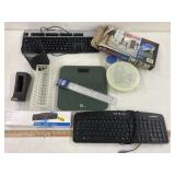 Office Items includes, 3 hole punch, keyboards,